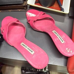 Hot pink Manolo Blahnik slides in hot pink. They are very sexy